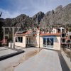 New house with 7 apartments, 900m2 with a territory of 1360m2, just a minute from the beach, Orahovac, Kotor municipality, Montenegro.