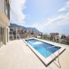 Moderna vila, 400m2 na parceli od 650m2, sa bazenom i prekrasnim pogledom na more i planine u Bečićima - Budva, Crna Gora.