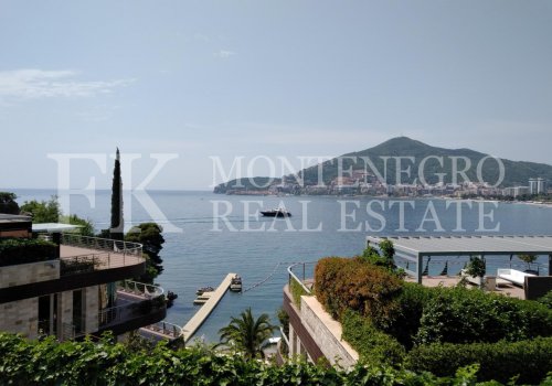 Three-bedroom apartment in Budva, 167 m2, just 50 m from the sea, with stunning panoramic view, Montenegro.