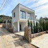 New and modern house, 160m2, in Bar, nestled on a gentle hill among olive trees, overlooking the sea, the city, the harbor, the old town, and the surrounding mountains.
