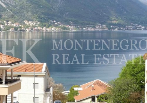 Family house, 220 m2, with three apartments, in Kotor, Montenegro, only 200m far from the sea, with garden and garage.
