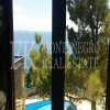 Luxury condo apartment in Budva, 120m2, above the Mogren beach, with an unobstructed sea view and a huge swimming pool, Montenegro.