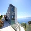 Luxury and modern villa, 331,41m2, with swimming pool and breathtaking view of the open sea, above the Mogren Beach, in Budva, Montenegro.