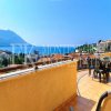 Velika vila, 450 m2, s prekrasnim panoramskim pogledom na more i planine, u Bečiće- Budva, Crna Gora.