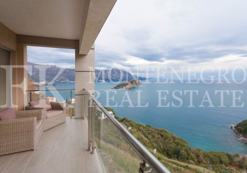 Prestigious penthouse apartment in Budva, 134 m2 plus roof terrace of 100 m2,  unique location and unobstructed view of the sea, the Budva town and the coastline of Budva Riviera, Montenegro.