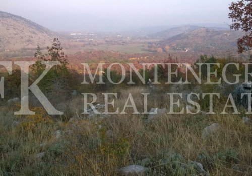 Sunny agricultural land, 48.000 m2, perfect for vineyard, overlooking  the capital city of Podgorica, in the village area Baloci, Montenegro.