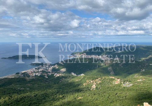 Urbanized land in Stanisici, 24.460 m2, with panoramic views of Budva, the Becici beach and the island of Sveti Nikola, Budva municipality, Montenegro.
