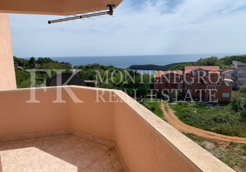 Very reasonable rental price! Sunny apartment, 66 m2, in Seoce - a quiet suburb of  Budva, with a nice sea view, in Montenegro.