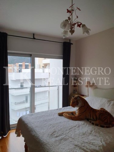 *Excellent apartment in Budva - Becici, 51m2 + 57m2 roof terrace with Jacuzzi and panoramic sea views, in Montenegro.