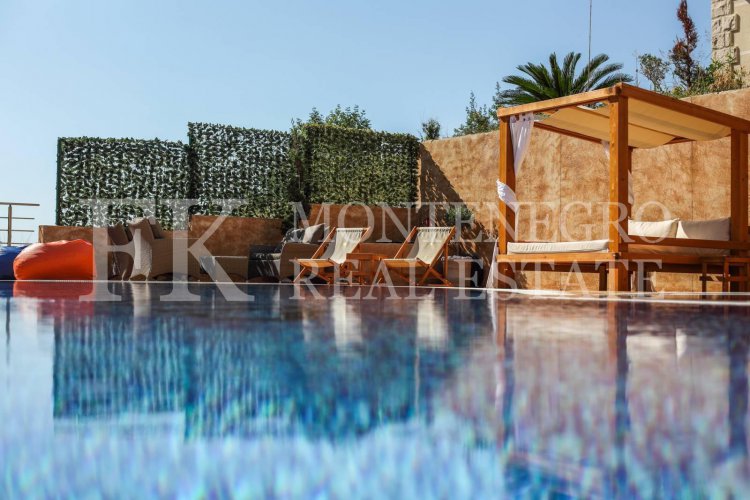 *Excellent apartment in Budva - Becici, 51m2 + 57m2 roof terrace with Jacuzzi and panoramic sea views, in Montenegro.