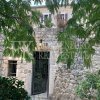 Renovated stone townhouse of the 17th century, 173 m2, in Budva-Chelobrdo, with a sea view and a garden, in Montenegro.