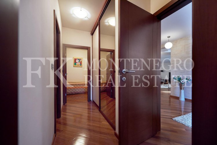 Excellent furnished apartment in the center of Budva, 116m2, with underground parking, in close proximity to the sea, in Montenegro.