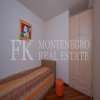 Excellent furnished apartment in the center of Budva, 116m2, with underground parking, in close proximity to the sea, in Montenegro.