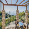 Luxury villa in the traditional Pashtrovsky style, 466m2, above Petrovac in the village of Krushevica,  with fantastic sea view, in Montenegro.