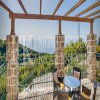 Luxury villa in the traditional Pashtrovsky style, 466m2, above Petrovac in the village of Krushevica, with fantastic sea view, in Montenegro.
