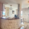 Luxury villa in the traditional Pashtrovsky style, 466m2, above Petrovac in the village of Krushevica, with fantastic sea view, in Montenegro.
