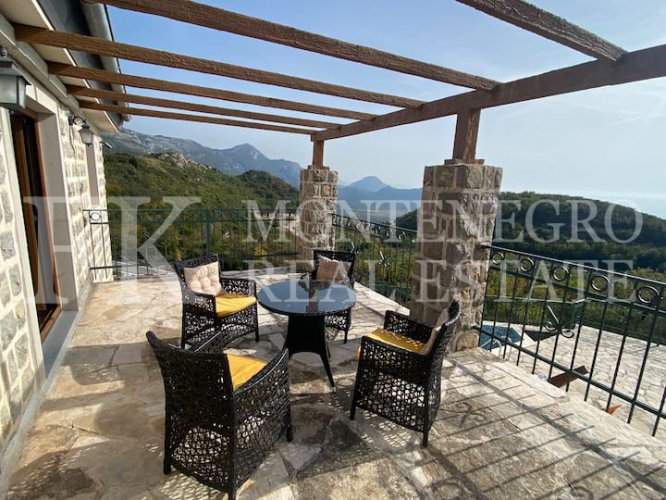 Luxury villa in the traditional Pashtrovsky style, 466m2, above Petrovac in the village of Krushevica, with fantastic sea view, in Montenegro.