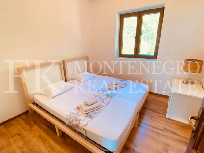 Luxury villa in the traditional Pashtrovsky style, 466m2, above Petrovac in the village of Krushevica, with fantastic sea view, in Montenegro.