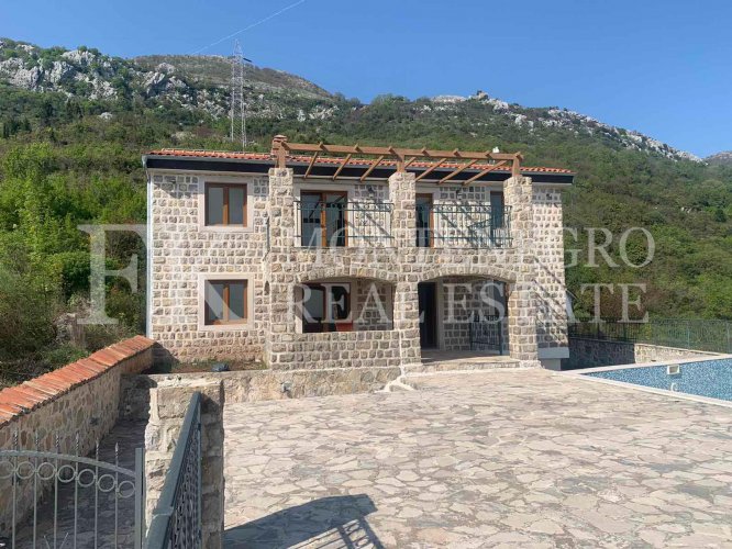 Luxury villa in the traditional Pashtrovsky style, 466m2, above Petrovac in the village of Krushevica, with fantastic sea view, in Montenegro.