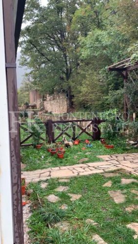 Semi-detached house, 132m2, above Bar, in a beautiful complex of villas in the village area Zupci, with sea view, swimming pool plus two garages, in Montenegro.