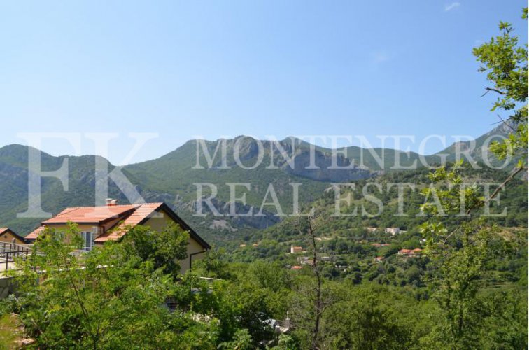 Semi-detached house, 132m2, above Bar, in a beautiful complex of villas in the village area Zupci, with sea view, swimming pool plus two garages, in Montenegro.