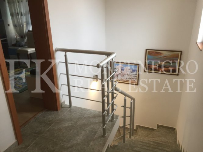 Semi-detached house, 132m2, above Bar, in a beautiful complex of villas in the village area Zupci, with sea view, swimming pool plus two garages, in Montenegro.