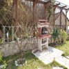 Semi-detached house, 132m2, above Bar, in a beautiful complex of villas in the village area Zupci, with sea view, swimming pool plus two garages, in Montenegro.