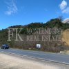 Building land, 11.565 m2, directly at the the main road (E80/65) Tivat - Budva, ideal for a hotel, shopping mall, business center, in Montenegro.