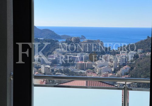 *New, sunny apartment in Budva - Ivanovici, 70m2, with panoramic sea and mountain views, in Montenegro.