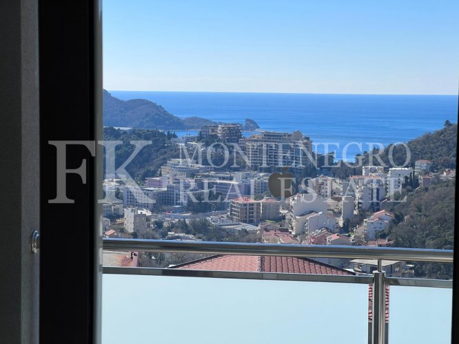 *New, sunny apartment in Budva - Ivanovici, 70m2, with panoramic sea and mountain views, in Montenegro.