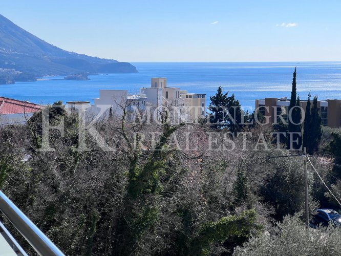 *New, sunny apartment in Budva - Ivanovici, 70m2, with panoramic sea and mountain views, in Montenegro.