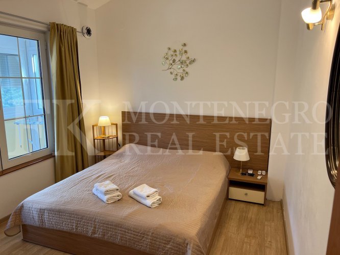 Semi-detached house, 132m2, above Bar, in a beautiful complex of villas in the village area Zupci, with sea view, swimming pool plus two garages, in Montenegro.