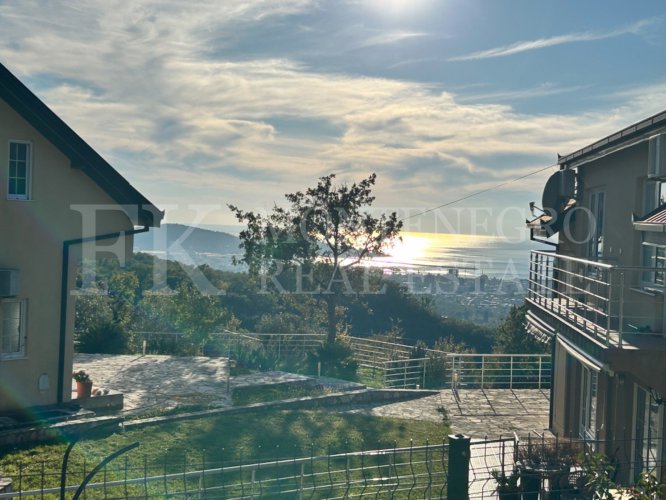 Semi-detached house, 132m2, above Bar, in a beautiful complex of villas in the village area Zupci, with sea view, swimming pool plus two garages, in Montenegro.